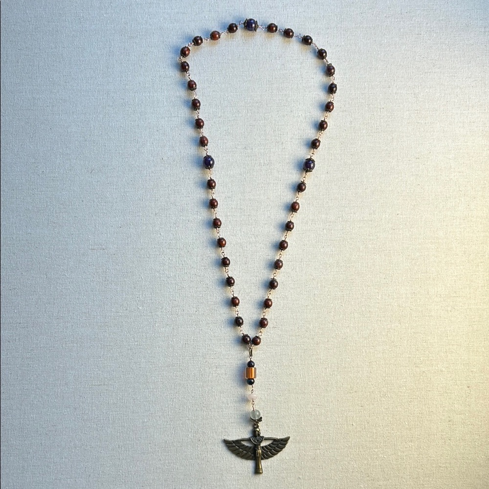 Brown Beaded Necklace with Winged Pendant